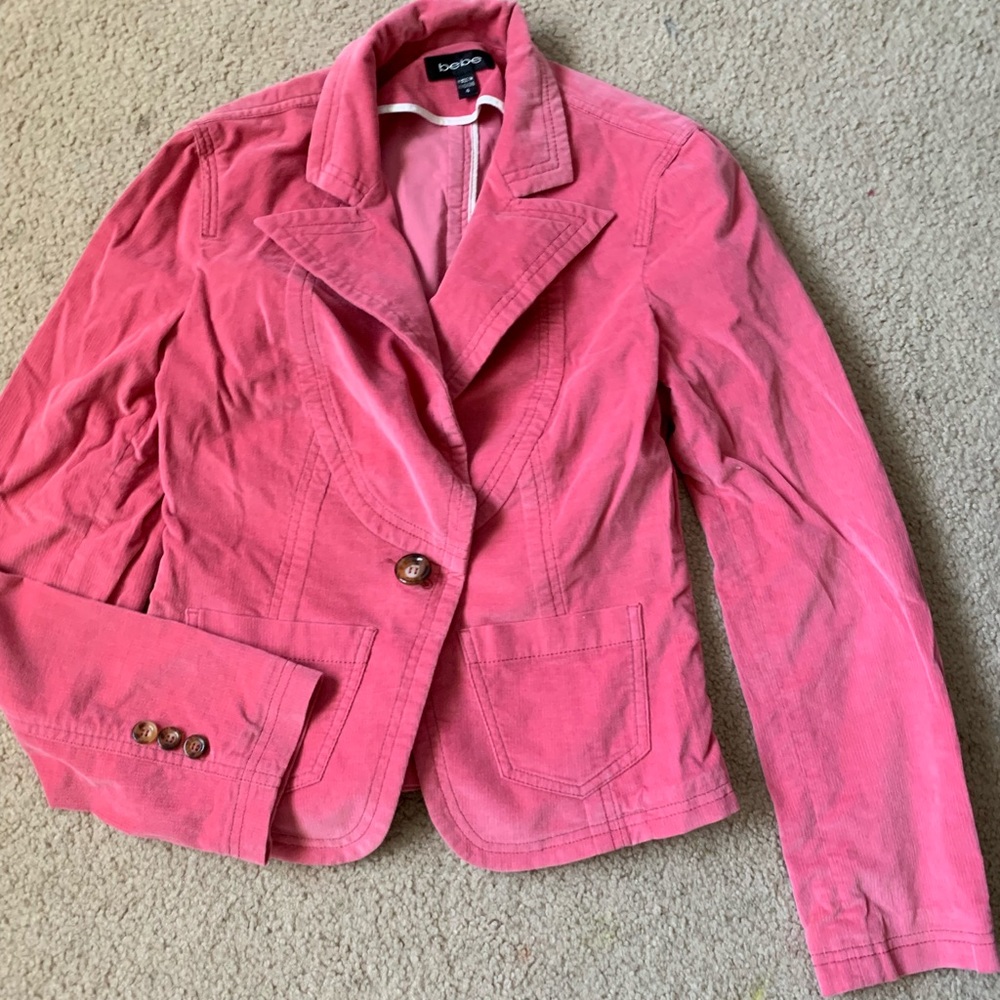 A pink Bebe jacket in great like new condition